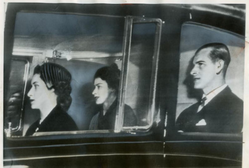 Black-and-white profile view of three people seated in a car, cinematic and mysterious, by Thomas Ruff.