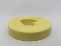 Damien Hirst's Vallium Yellow, polyurethane resin sculpture, shaped like a large yellow Valium tablet with heart cutout.