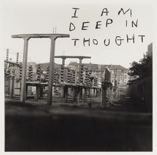 David Shrigley I Am Deep In Thought C-print with power station photo and handwritten text overlaid in black. 