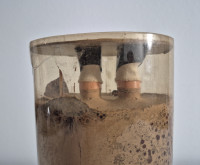 Dieter Roth Untitled Puppe in Schokolade sculpture with doll encased in aged chocolate cylinder, 1969 conceptual artwork