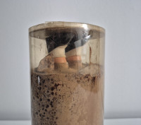 Dieter Roth Untitled Puppe in Schokolade sculpture with doll encased in aged chocolate cylinder, 1969 conceptual artwork