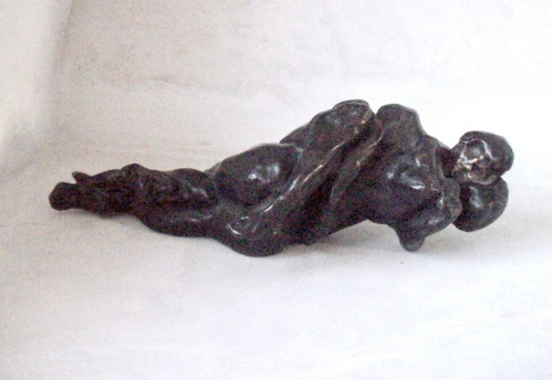 Eva Claessens' A Hug III, 2023 bronze sculpture of two intertwined figures embracing in a reclining position, with hand-painted patina.