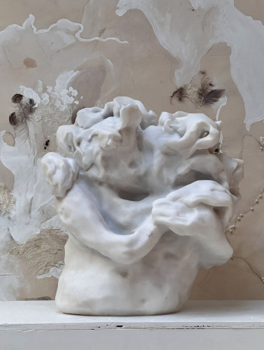 Eva Claessens A Hug 2025 marble sculpture of intertwined figures in tender embrace on neutral background  