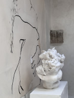 Eva Claessens A Hug 2025 marble sculpture of intertwined figures in tender embrace on neutral background  