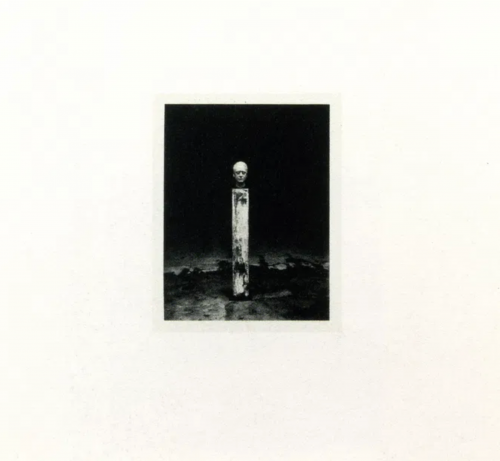 Gerhard Richter Self-portrait offset print of a sculpted head on a post, centered in a dark space, evoking fragmented identity.