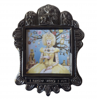 Grayson Perry ceramic artwork with AI-generated image of a doll-like figure in yellow dress, surrounded by cats and symbols, in ornate black ceramic frame reading 