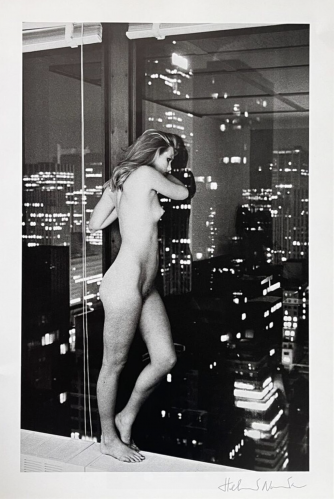 Helmut Newton Patti Hansen over Manhattan photolithograph of nude woman standing before city skyline at night in black and white