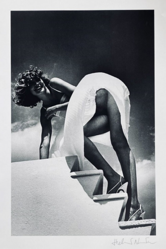 Helmut Newton St Jean Cap Ferrat 1978 photolithograph of woman in white skirt on stairs shot from below against dramatic sky