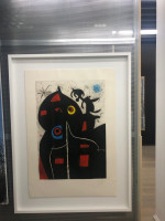 Joan Miró's Pantagruel, 1978, etching and aquatint with bold black shapes, red, yellow, blue circles, and abstract figure, on textured background.