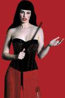 Marc Lagrange Betty Page Trilogy triptych of model in fetish-inspired attire against vivid red background, exploring femininity and rebellion.