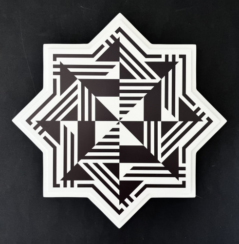 Marcello Morandini Sculptura 763 printed wood star-shaped sculpture with black and white geometric optical pattern.