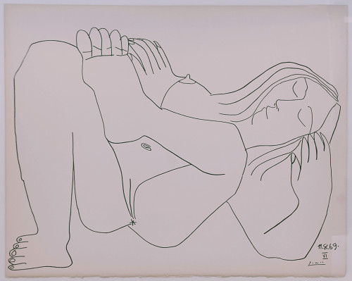 Pablo Picasso’s Couples and Female Nudes VI, lithograph, shows a reclining nude woman in a serene pose, outlined with fluid black lines on white background. Pablo Picasso’s Couples and Female Nudes VI, lithograph, shows a reclining nude woman in a serene pose, outlined with fluid black lines on white background.