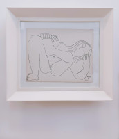 Pablo Picasso’s Couples and Female Nudes VI, lithograph, shows a reclining nude woman in a serene pose, outlined with fluid black lines on white background. Pablo Picasso’s Couples and Female Nudes VI, lithograph, shows a reclining nude woman in a serene pose, outlined with fluid black lines on white background.