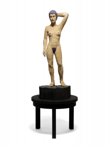 Stephan Balkenhol Femme burlesque wooden sculpture of nude woman with purple hair standing on black pedestal, carved with rough texture