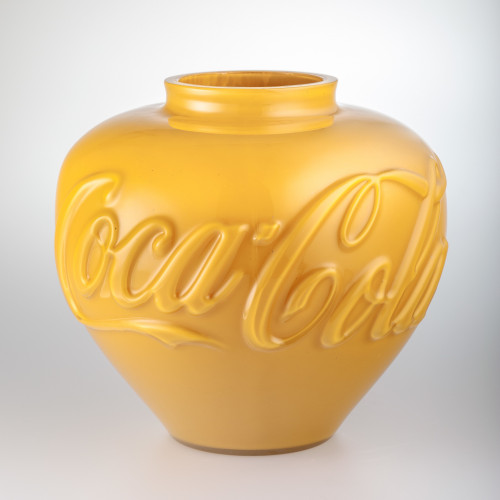 Ai Weiwei Vase (Mustard) in Murano glass with embossed Coca-Cola logo and smooth, vibrant yellow finish.