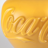 Ai Weiwei Vase (Mustard) in Murano glass with embossed Coca-Cola logo and smooth, vibrant yellow finish.