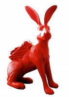 William Sweetlove's Cloned Hare with Backpack, 2009, red resin sculpture of a large hare wearing a backpack, standing 140 cm tall.